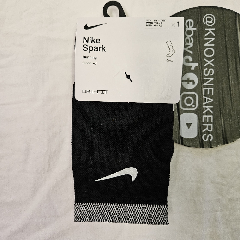 The Nike Spark Cushioned Crew Running Socks in men's size 6-7.5 or women's 7.5-9